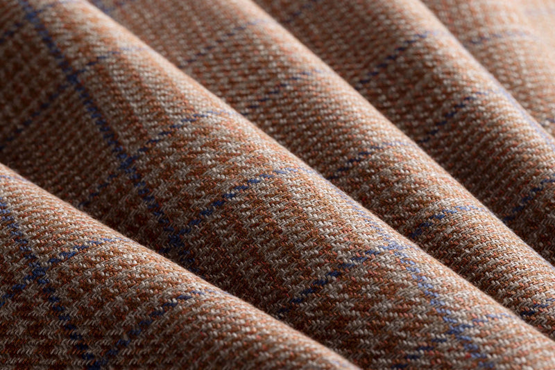 Close view of English suiting cloth selected for a bespoke suit