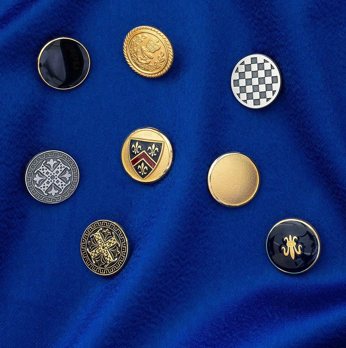 22 carat gold buttons bespoke suit luxury detail