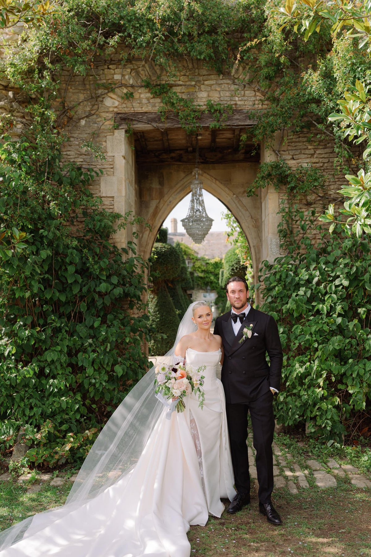 A groom and his family wearing coordinated wedding tailoring