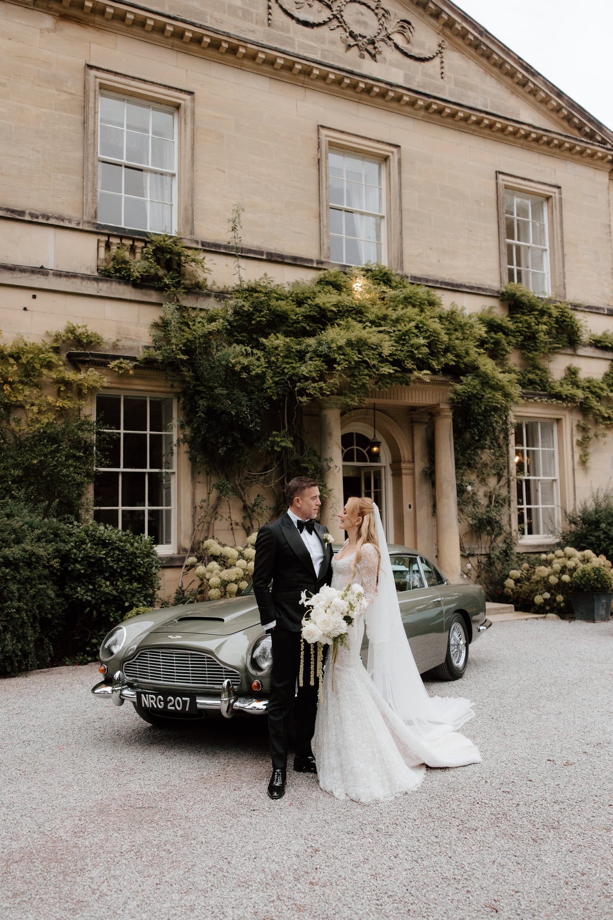 A groom and his family wearing coordinated wedding tailoring